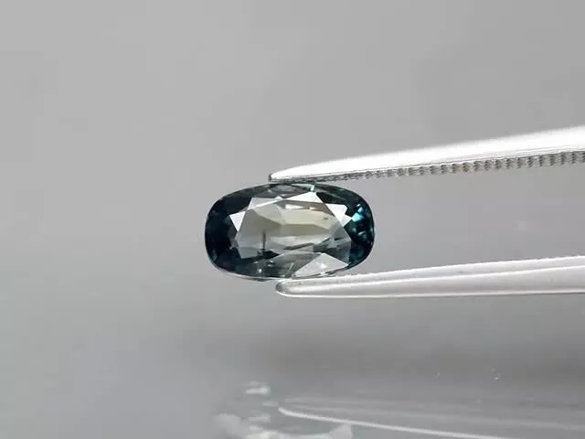 back view of Certified Gemstones 1.25ct Cushion Unheated Greenish Blue Sapphire, Madagascar - VS