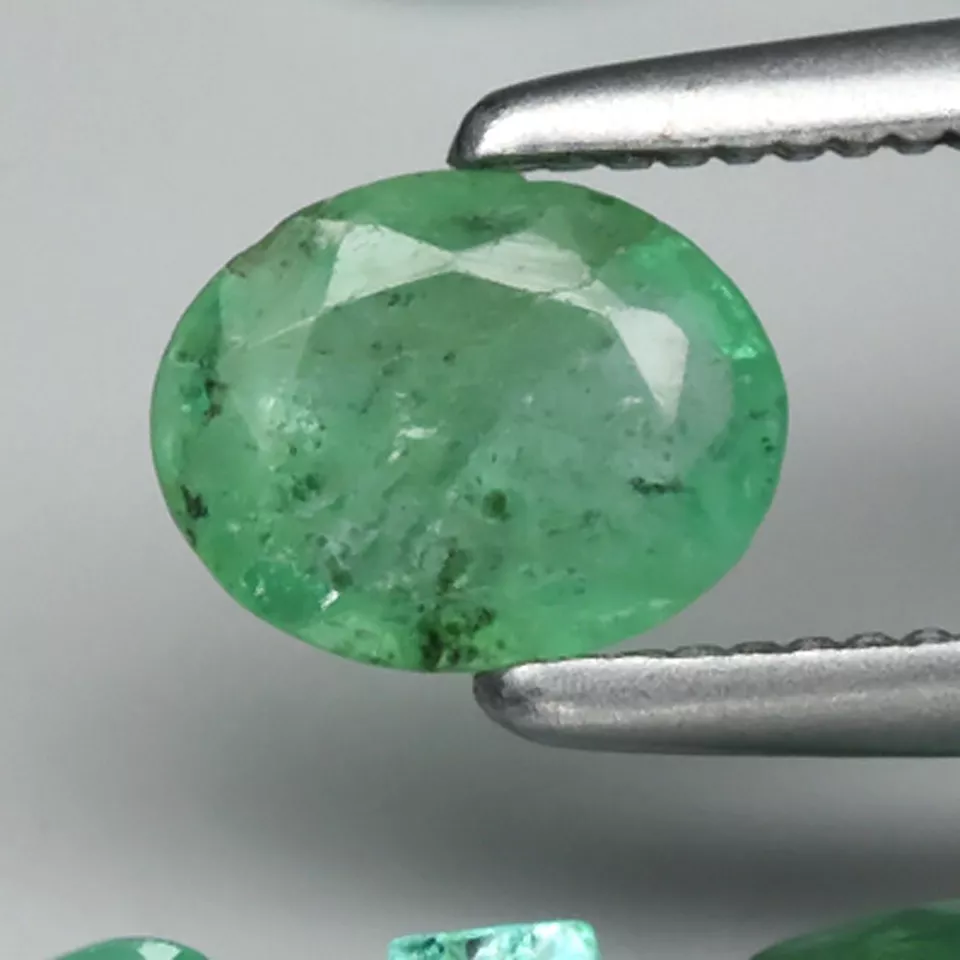 Close up of Certified Gemstones 9pcs Lot 1.64ct-t.w Emeralds from Zambia - Small-size