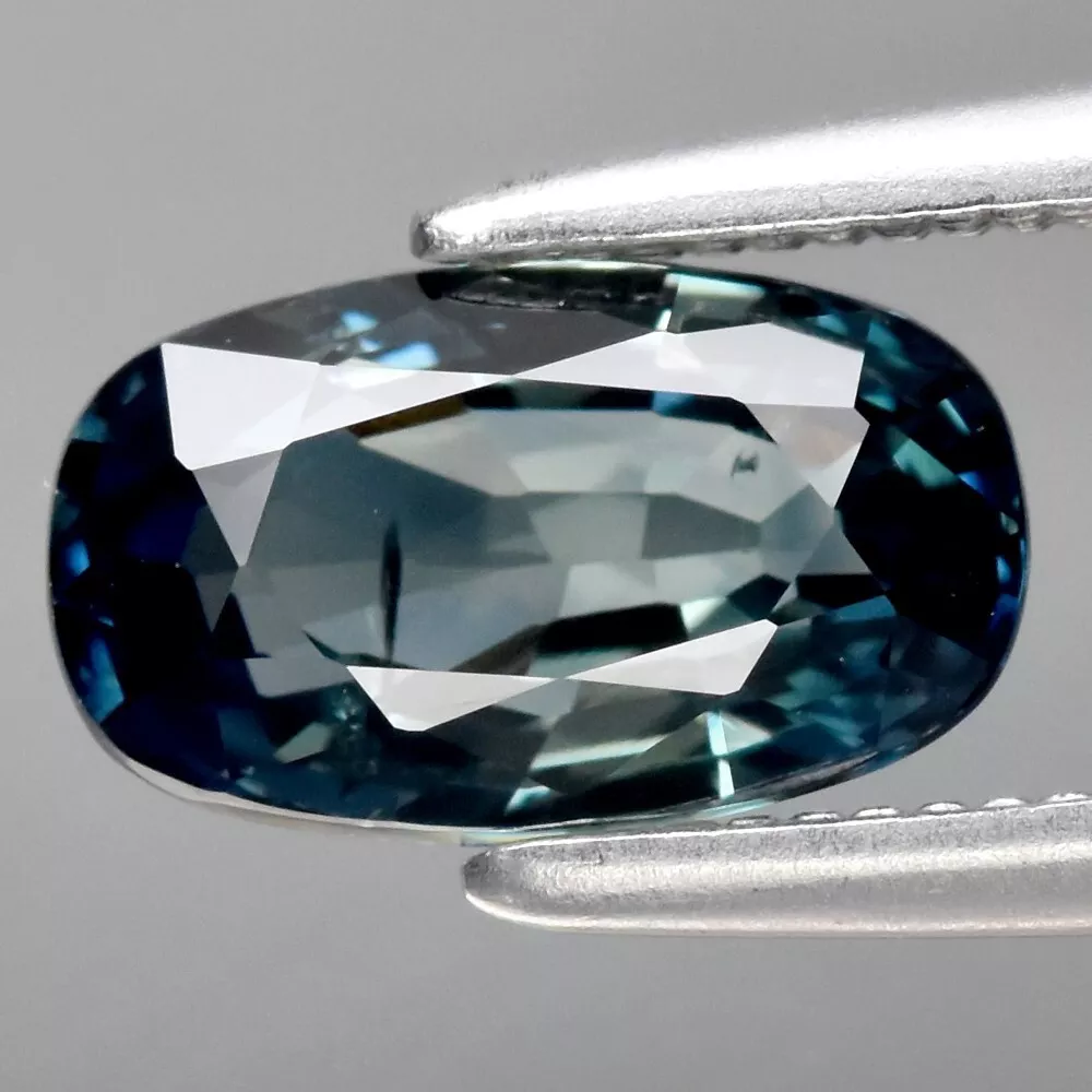 Close up view of Certified Gemstones 1.25ct Cushion Unheated Greenish Blue Sapphire, Madagascar - VS