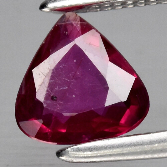 close up view of Certified Gemstones 0.54ct Pear-cut Mozambique Ruby - Unheated/Untreated