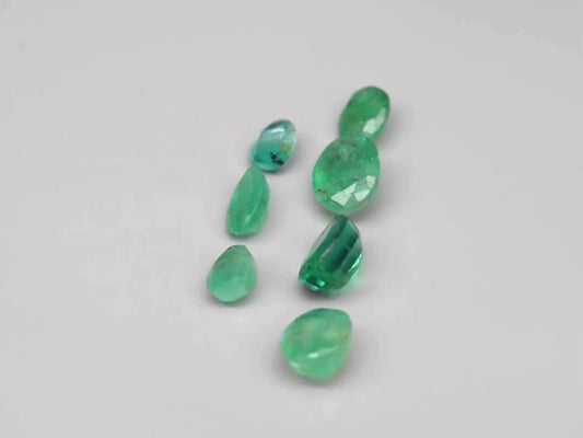 video showcase of Certified Gemstones 7pcs Lot 2.06ct t.w Pear & Oval cut Emeralds - Zambia